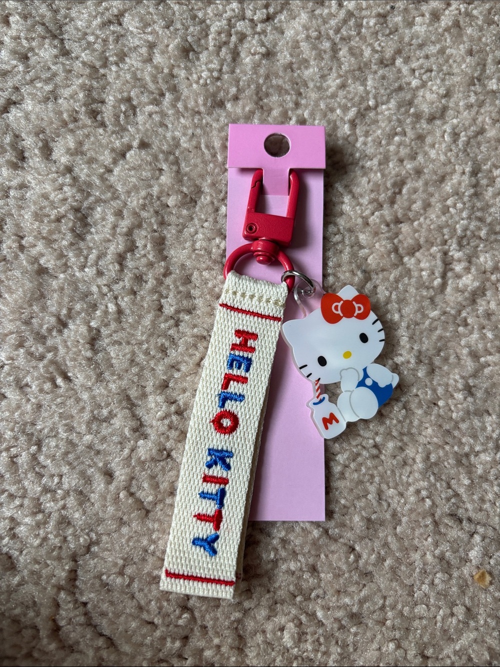 Limited edition Sanrio Hello Kitty Red, Cream & Blue Wrist Strap Keychain